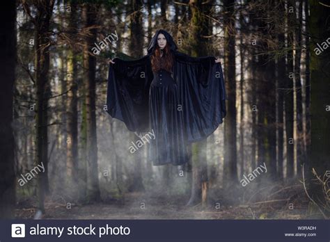 Witch levitating on a swing